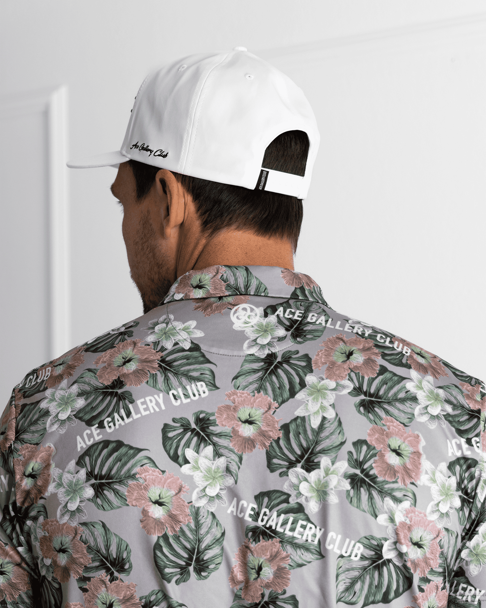 THE MONSTERA ZIP POLO - FLORAL